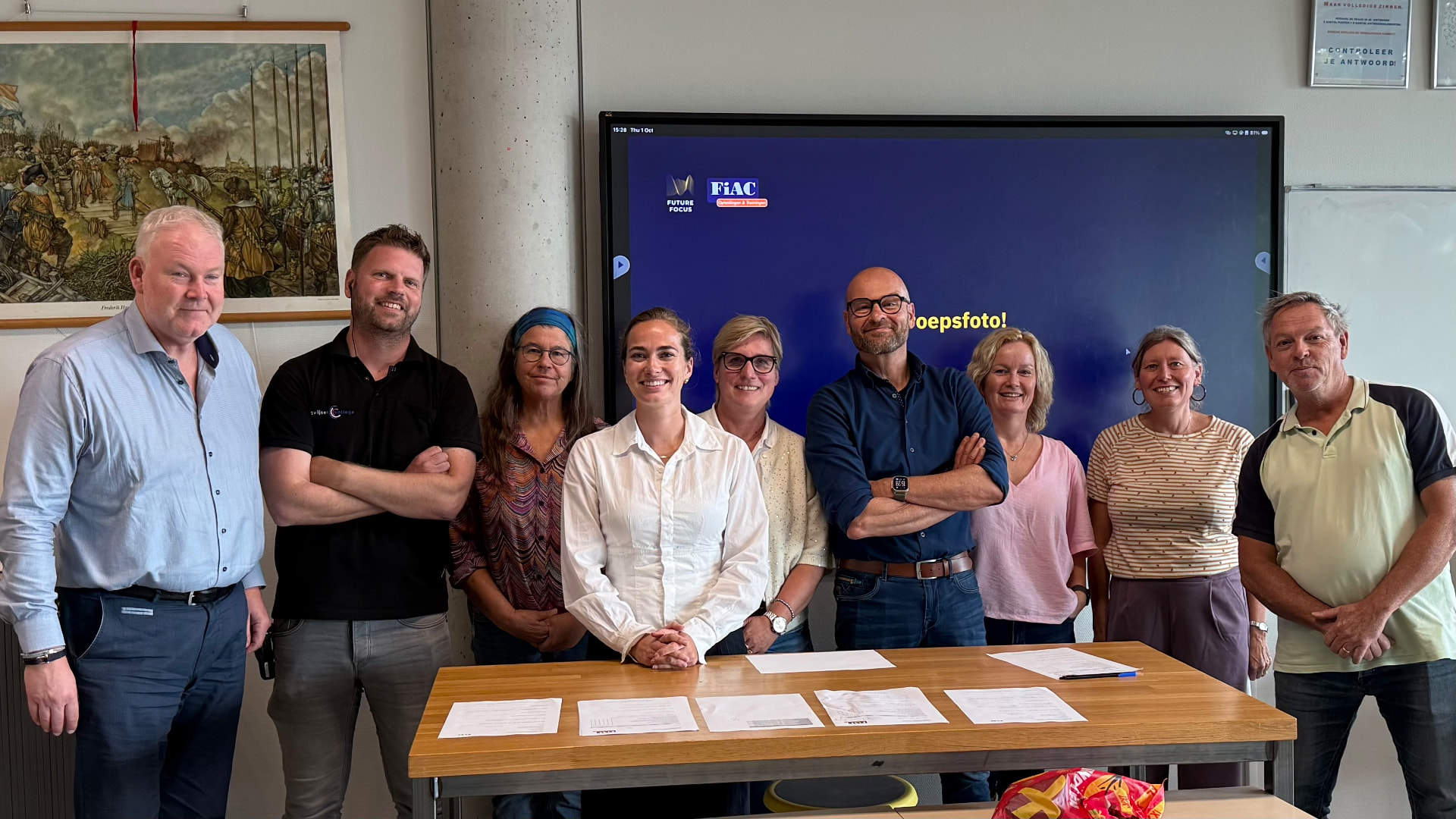 Group photo of AI training participants in the classroom